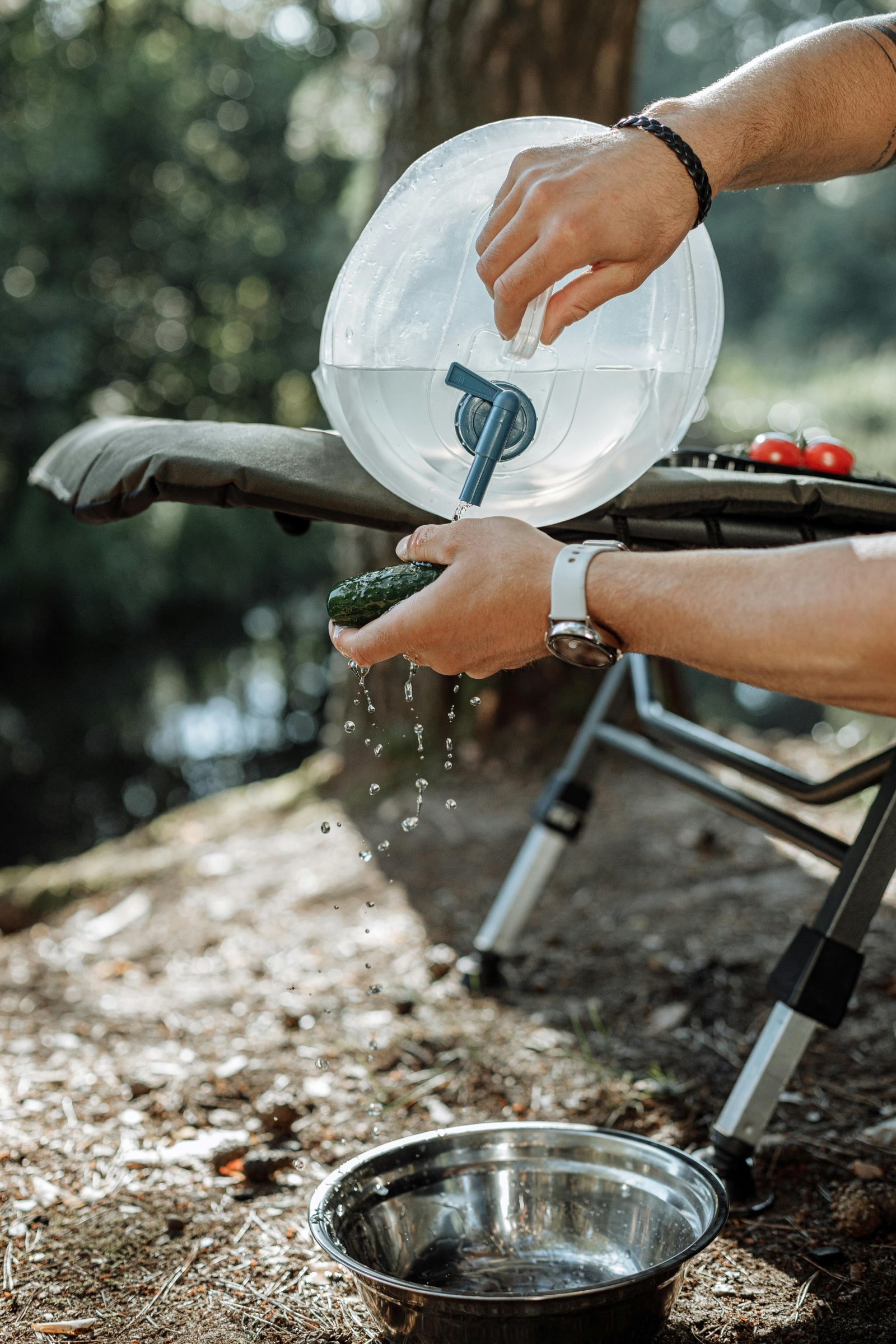 A person pours water into a bowl, demonstrating a simple yet essential kitchen task.