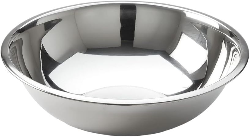 A stainless steel mixing bowl placed on a clean white background, showcasing its sleek and shiny surface.