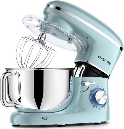 An electric mixer positioned beside a blue mixing bowl, showcasing its sleek design and functionality in a kitchen setting.