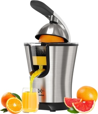 A juicer containing a fresh orange, showcasing the vibrant color and texture of the fruit ready for juicing. The juice is being squeezed from the orange into a small glass