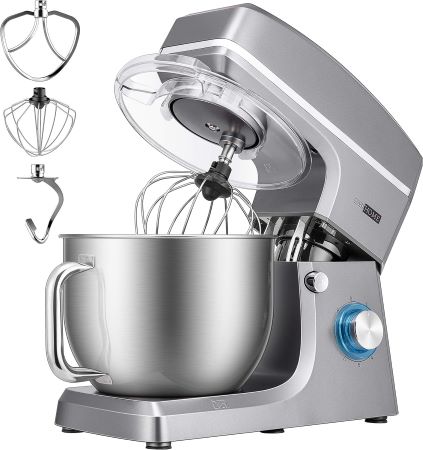 A kitchen mixer with a bowl and various accessories arranged neatly on a countertop, ready for baking tasks.